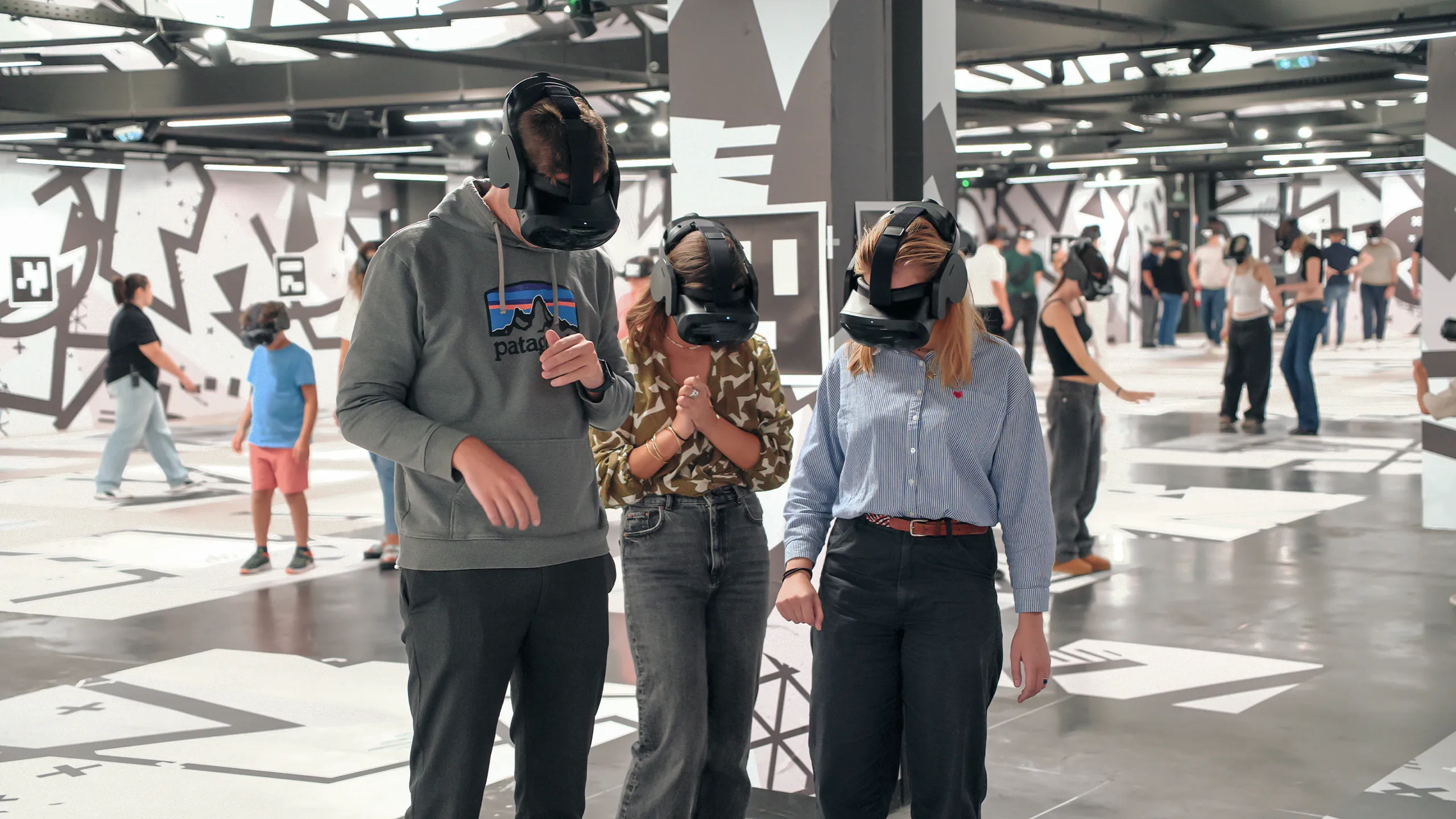 People experiencing VR with Excurio technology